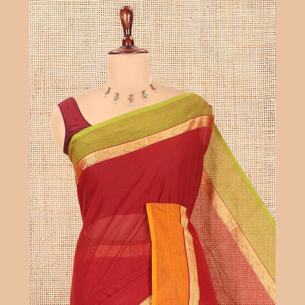 Pothys Maroon Plain Chettinad Cotton Saree, a Contrast Ganga-Jamuna Border, Striped Pallu, and a Matching Blouse