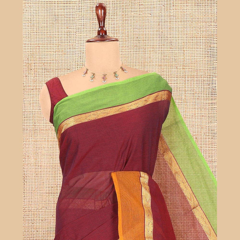 Pothys Red Plain Chettinad Cotton Saree, a Contrast Ganga-Jamuna Border, Striped Pallu, and a Matching Blouse