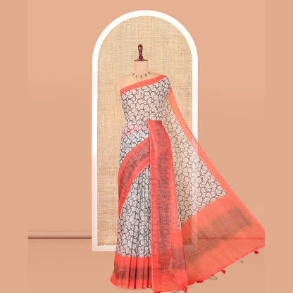 Pothys Chikku-Orange Linen Cotton Saree, Elevated with Geometric Print, a Contrast Ikat Border, Printed Pallu, and Contrast Blouse