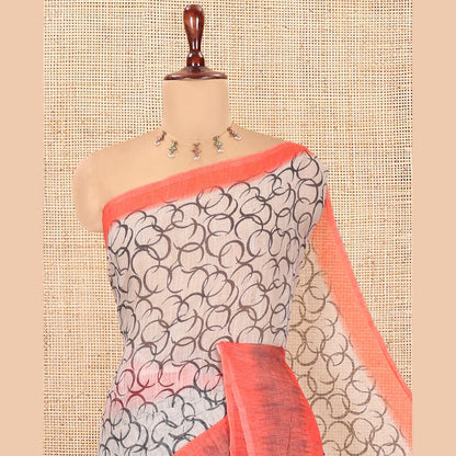 Pothys Chikku-Orange Linen Cotton Saree, Elevated with Geometric Print, a Contrast Ikat Border, Printed Pallu, and Contrast Blouse