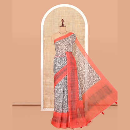 Pothys Chikku-Orange Linen Cotton Saree, Decorated with Intricate Print, a Contrast Ikat Border, Printed Pallu, and Contrast Blouse