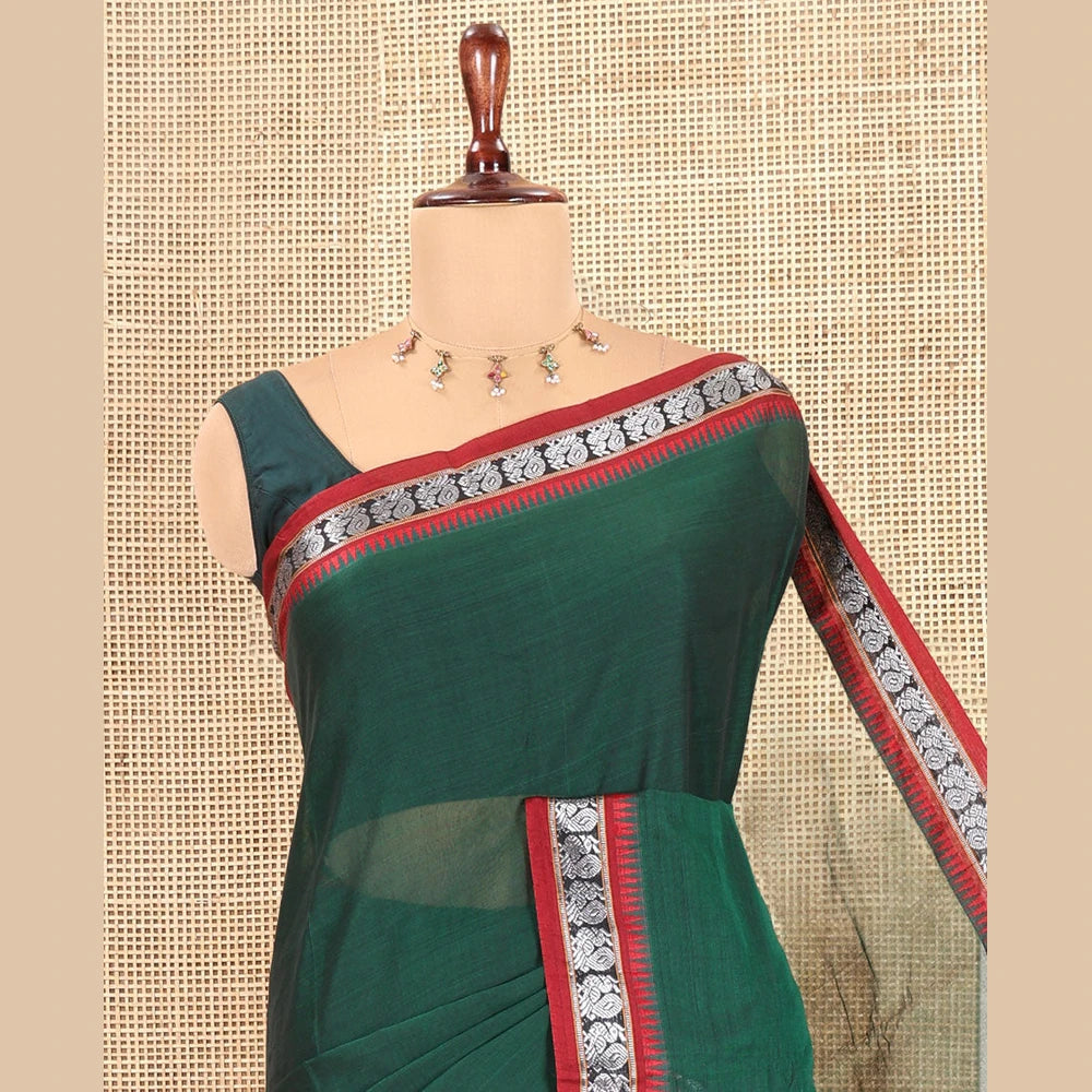 Pothys Green Plain Mercerized Cotton Saree, a Contrast Peacock Temple Thread Border, Striped Pallu, and a Matching Blouse