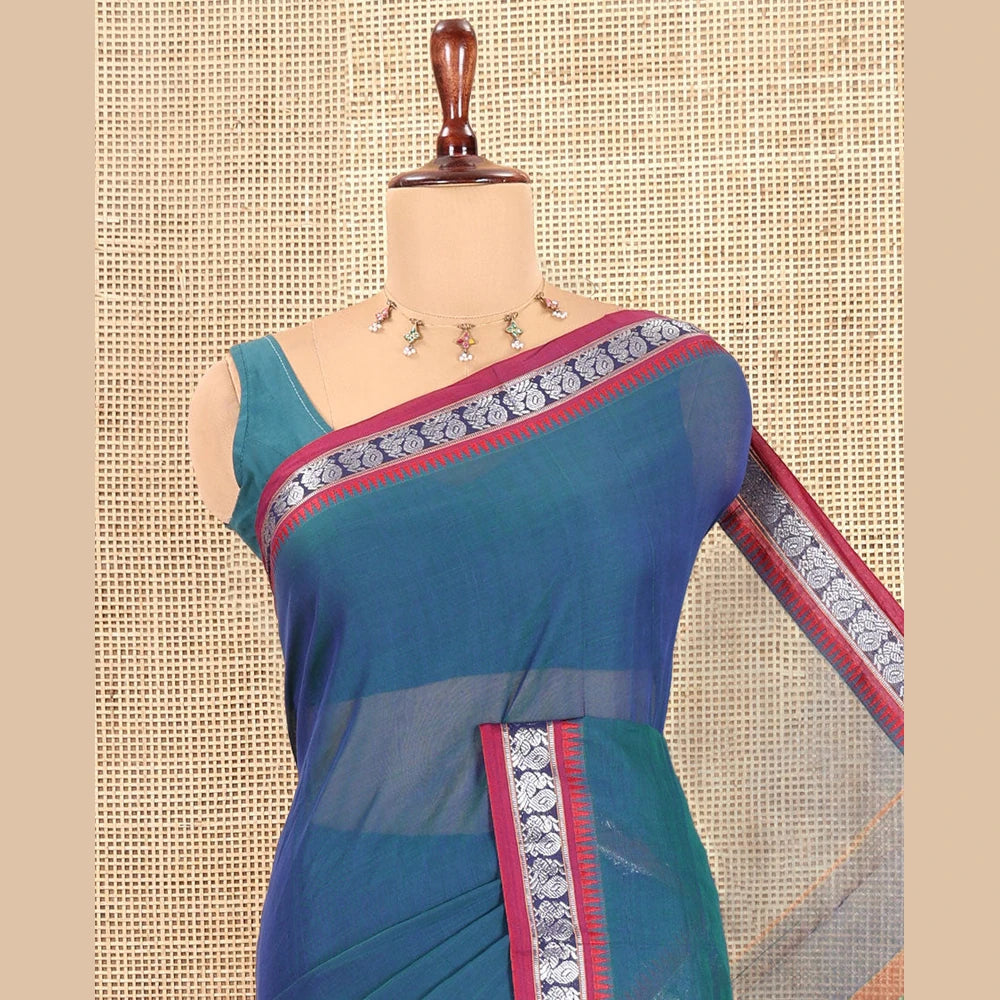 Pothys Blue Plain Mercerized Cotton Saree, a Contrast Peacock Temple Thread Border, Striped Pallu, and a Matching Blouse
