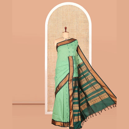 Pothys Green Kalyani Cotton Saree, Subtly Sparkled with Thread Buttas, a Contrast Traditional Zari Border, Grand Pallu, and a Contrast Blouse