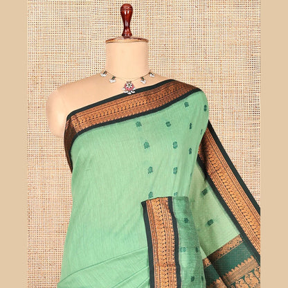 Pothys Green Kalyani Cotton Saree, Subtly Sparkled with Thread Buttas, a Contrast Traditional Zari Border, Grand Pallu, and a Contrast Blouse