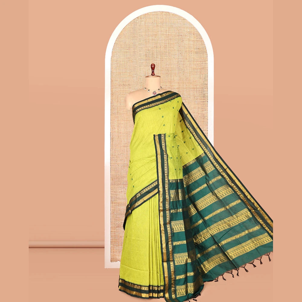 Pothys Leaf Green Kalyani Cotton Saree, Finely Crafted with Thread Buttas, a Contrast Traditional Rettai Pettu Zari Border, Grand Pallu, and a Contrast Blouse