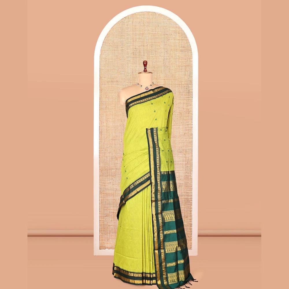 Pothys Leaf Green Kalyani Cotton Saree, Finely Crafted with Thread Buttas, a Contrast Traditional Rettai Pettu Zari Border, Grand Pallu, and a Contrast Blouse
