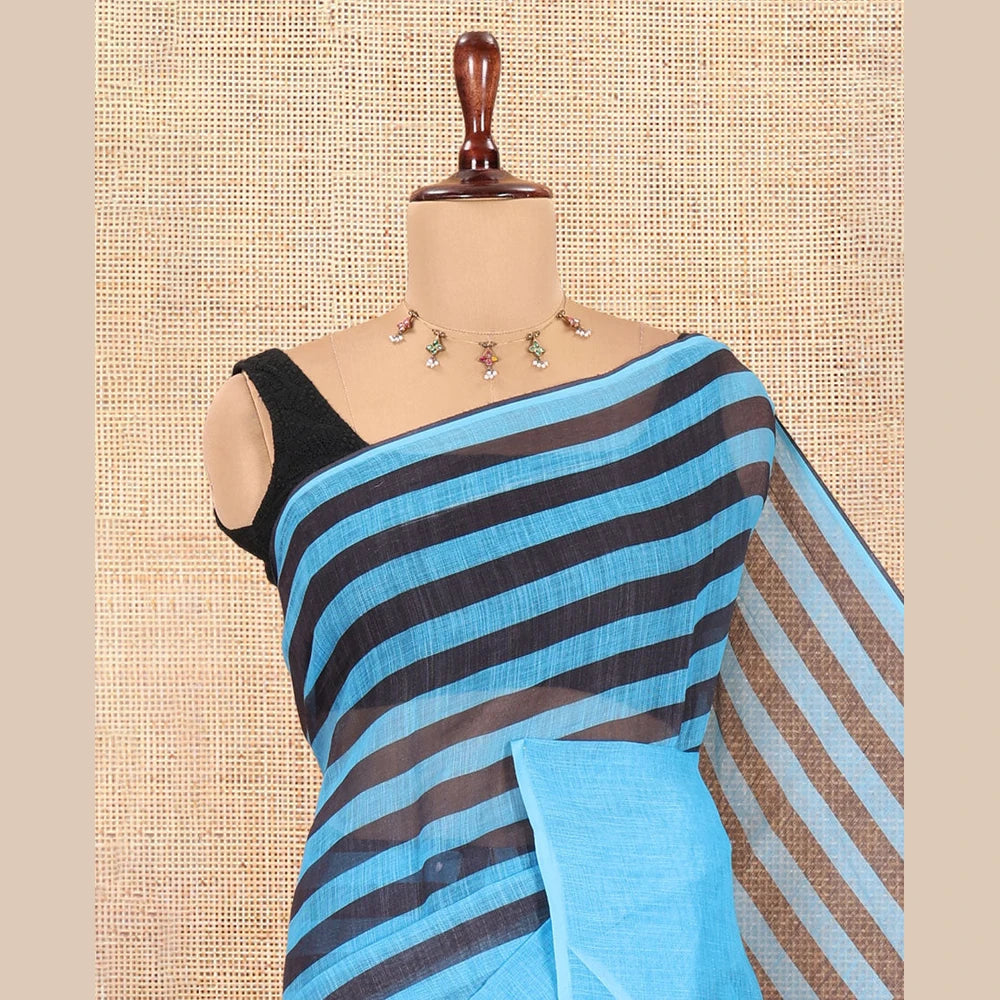 Pothys Borderless Blue Linen Cotton Saree, Ornamented with Stripes, a Self-Pallu of Stripes, and a Contrast Blouse