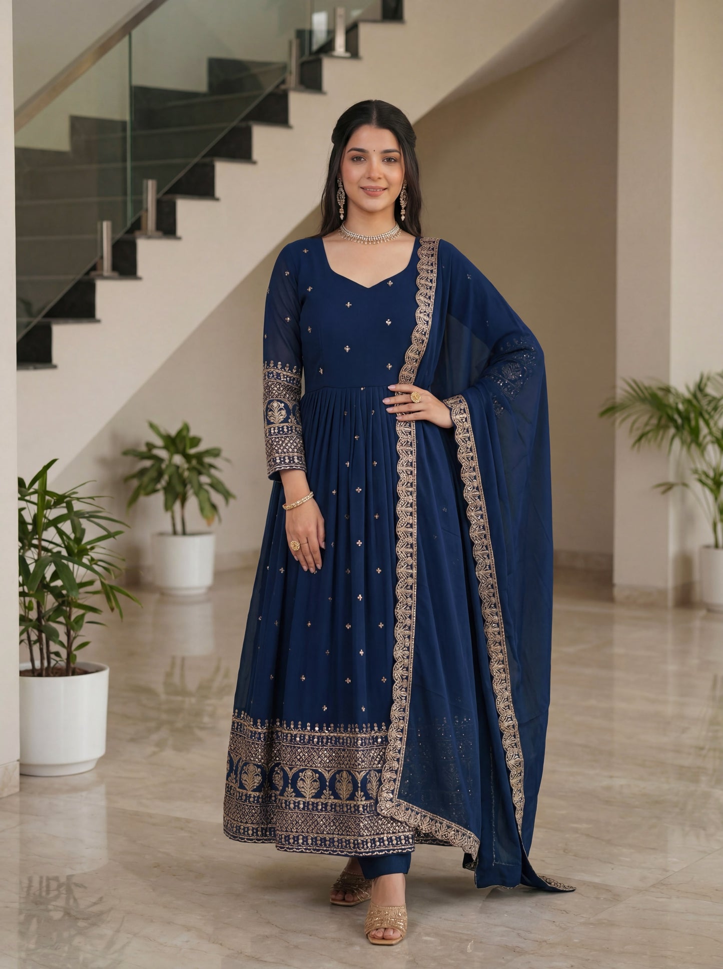 Vastra Creation's Designer Embroidered Vichitra Silk Gown Set